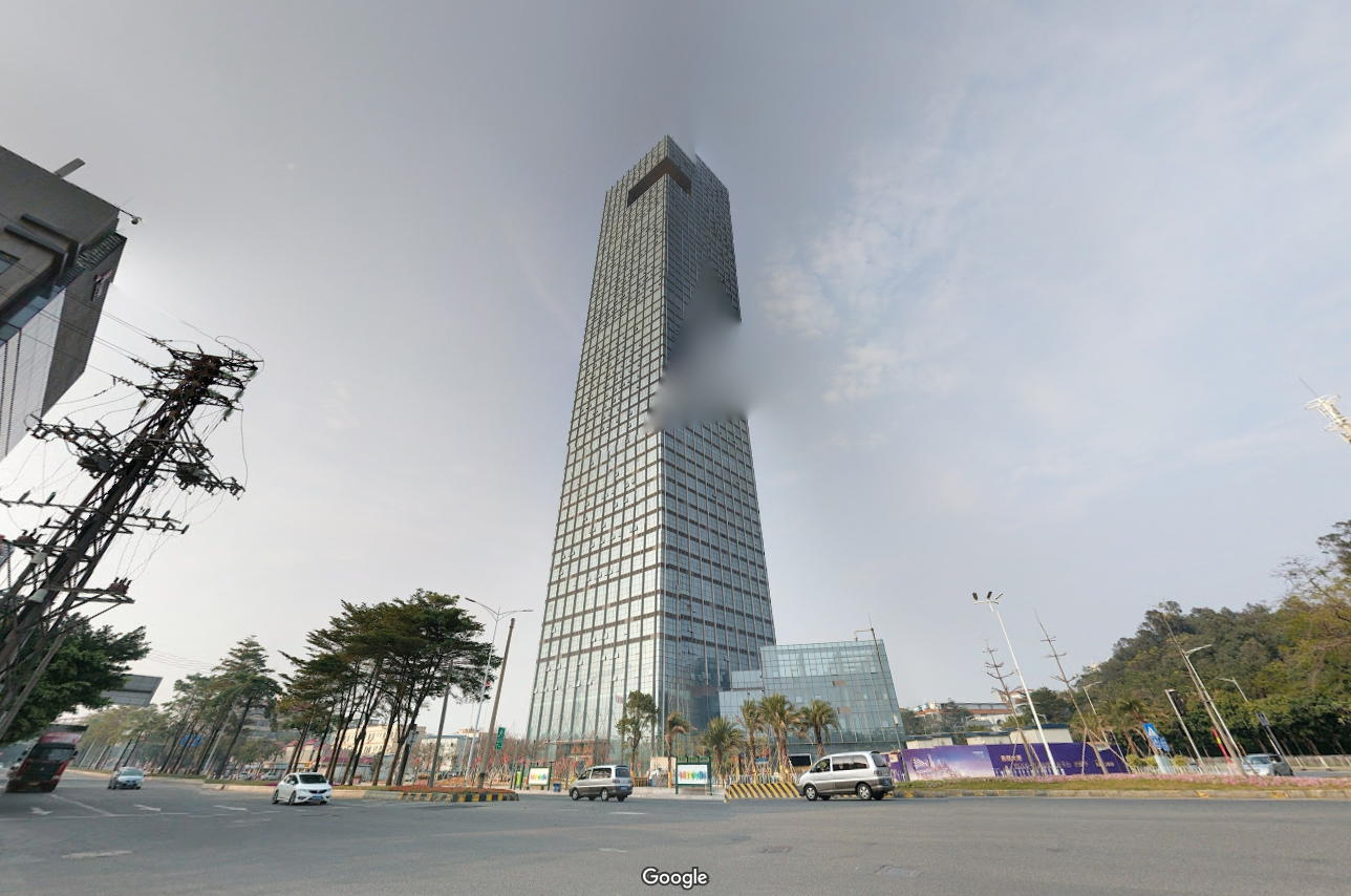 Screenshot of Google Street View showing a large office building.